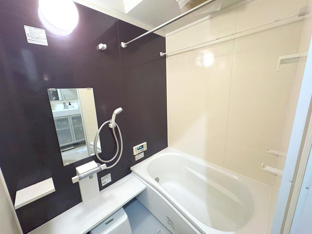 Bathroom with a deep soaking tub and shower.